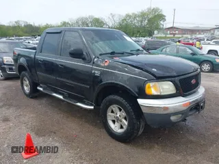 2002 Ford F-150 XLT with VIN 1FTRW08L72KD27457, listed as a IAAI auction lot 41993148 with 372,589 mi miles. Bid and sale history available at carsss.com. Image 1.