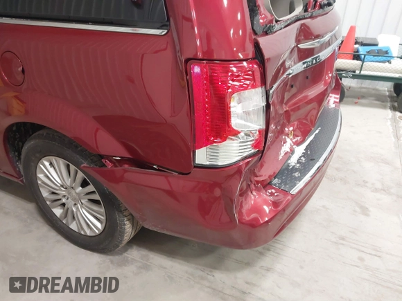 2015 Chrysler Town & Country Limited Platinum with VIN 2C4RC1GGXFR597180, listed as a IAAI auction lot 41374817 with 90,088 mi miles and . Bid and sale history available at DreamBid. Image 17.