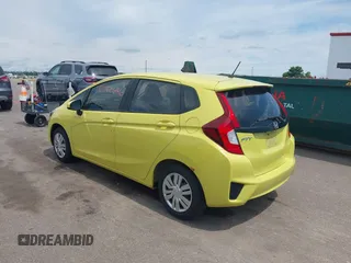 2015 Honda Fit LX z VIN 3HGGK5H58FM768970, wystawiony jako IAAI lot #42760686 z przebiegiem 89 531 mil mil oraz . Historia ofert i sprzedaży dostępna na DreamBid. Obrazek 3.