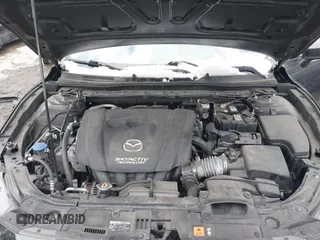 2018 Mazda 3 Touring with VIN 3MZBN1V35JM174323, listed as a IAAI auction lot 41412732 with 80,008 mi miles. Bid and sale history available at carsss.com. Image 10.