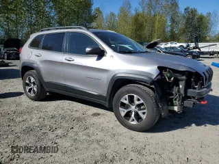 2018 Jeep Cherokee Trailhawk with VIN 1C4PJMBXXJD619860, listed as a Copart auction lot 52598535 with 82,430 mi miles and Salvage Title. Bid and sale history available at carsss.com. Image 4.