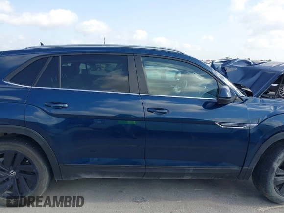2021 Volkswagen Atlas SE z VIN 1V2WC2CA4MC232301, wystawiony jako IAAI lot #42538962 z przebiegiem Nie podano mil oraz . Historia ofert i sprzedaży dostępna na DreamBid. Obrazek 14.
