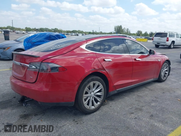 2016 Tesla Model S 70 with VIN 5YJSA1E16GF135833, listed as a IAAI auction lot 42084421 with 97,615 mi miles and . Bid and sale history available at DreamBid. Image 4.