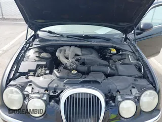 2003 Jaguar S-Type with VIN SAJEA01T93FM64497, listed as a IAAI auction lot 41804705 with 224,978 mi miles and . Bid and sale history available at DreamBid. Image 10.