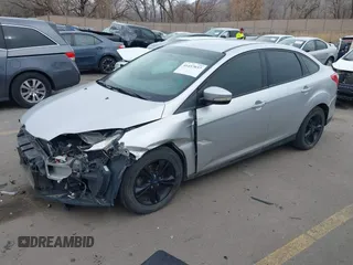 2013 Ford Focus SE with VIN 1FADP3F20DL361469, listed as a IAAI auction lot 41457037 with 127,852 mi miles. Bid and sale history available at carsss.com. Image 2.