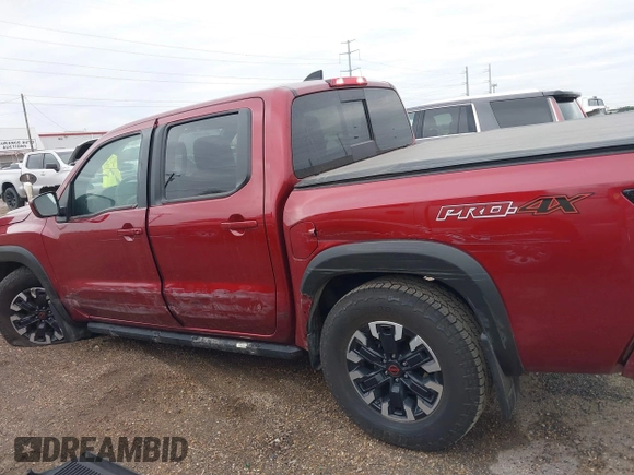 2023 Nissan Frontier Pro-4X z VIN 1N6ED1EK4PN652544, wystawiony jako IAAI lot #41309698 z przebiegiem 26 173 mil mil oraz . Historia ofert i sprzedaży dostępna na DreamBid. Obrazek 14.