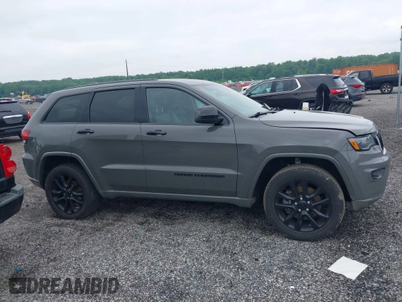 2021 Jeep Grand Cherokee Laredo E with VIN 1C4RJFAG1MC655503, listed as a IAAI auction lot 42387765 with 38,423 mi miles and . Bid and sale history available at DreamBid. Image 13.