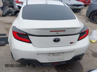2023 Toyota GR86 Premium with VIN JF1ZNBF16P8756664, listed as a IAAI auction lot 40910934 with 9,055 mi miles. Bid and sale history available at carsss.com. Image 16.