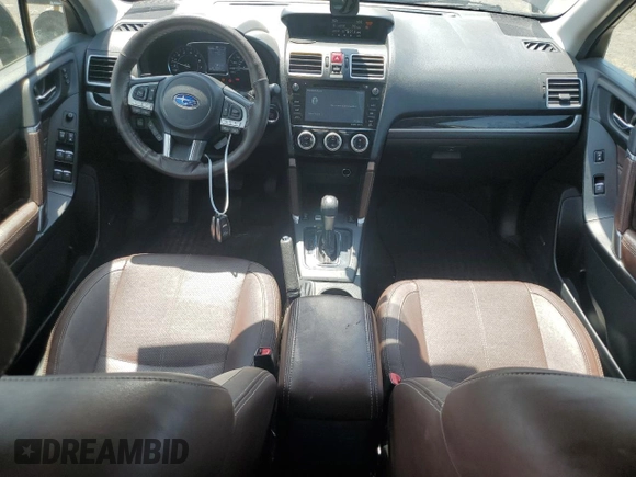 2017 Subaru Forester Touring with VIN JF2SJGWC9HH402713, listed as a Copart auction lot 62257345 with 128,903 mi miles and Salvage title. Bid and sale history available at DreamBid. Image 8.