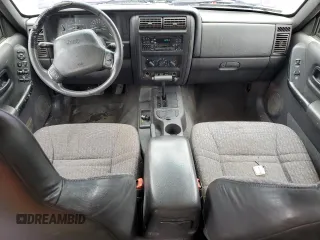 1999 Jeep Cherokee Sport с VIN 1J4FT68S6XL586023, выставлен на аукционе Copart как лот 58907195 с пробегом 391 932 миль миль и Списание • Salvage title. История ставок и продаж доступна на DreamBid. Изображение 8.