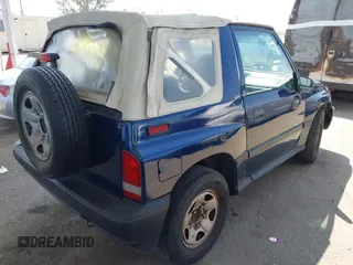 1997 Chevrolet Tracker z VIN 2CNBE1865V6926154, wystawiony jako IAAI lot #42207157 z przebiegiem 176 104 mil mil oraz . Historia ofert i sprzedaży dostępna na DreamBid. Obrazek 4.