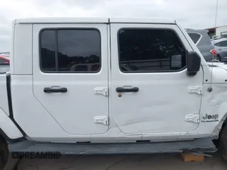 2021 Jeep Gladiator High Altitude with VIN 1C6HJTFG8ML551570, listed as a IAAI auction lot 42229235 with 56,959 mi miles and . Bid and sale history available at DreamBid. Image 14.