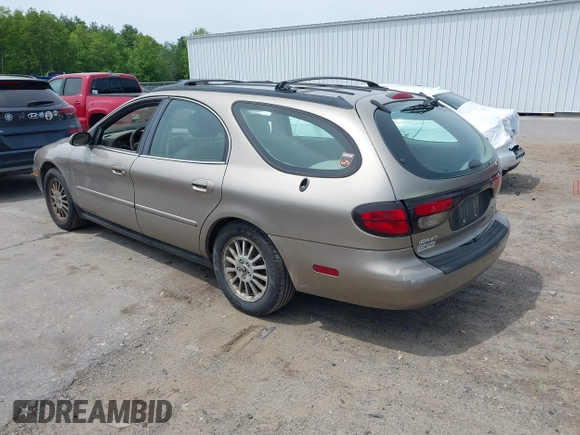 2004 Mercury Sable LS Premium z VIN 1MEHM59S34A626679, wystawiony jako IAAI lot #42364055 z przebiegiem 98 760 mil mil oraz . Historia ofert i sprzedaży dostępna na DreamBid. Obrazek 3.