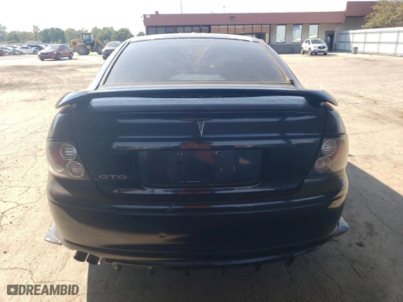 2004 Pontiac GTO with VIN 6G2VX12G04L200129, listed as a Copart auction lot 71822564 with 124,155 mi miles and Salvage Title. Bid and sale history available at carsss.com. Image 6.