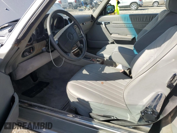 1989 Mercedes-Benz 560 Series 560SL with VIN WDBBA48D3KA097999, listed as a Copart auction lot 48649625 with 124,752 mi miles and Salvage Title. Bid and sale history available at carsss.com. Image 7.