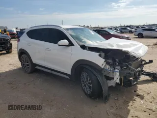 2020 Hyundai Tucson Sport with VIN KM8J33ALXLU093849, listed as a Copart auction lot 82670704 with 87,584 mi miles and Clean title. Bid and sale history available at DreamBid. Image 4.