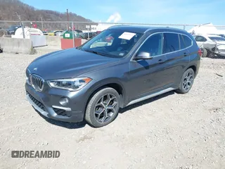2017 BMW X1 sDrive28i with VIN WBXHU7C37H5H32815, listed as a IAAI auction lot 41837113 with 67,097 mi miles. Bid and sale history available at carsss.com. Image 2.