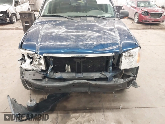 2002 GMC Envoy SLT with VIN 1GKDT13S022388743, listed as a IAAI auction lot 41338364 with 206,179 mi miles. Bid and sale history available at carsss.com. Image 6.