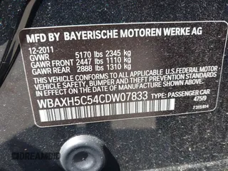 2012 BMW 5 Series 528i xDrive with VIN WBAXH5C54CDW07833, listed as a IAAI auction lot 42058437 with 118,213 mi miles and . Bid and sale history available at carsss.com. Image 9.