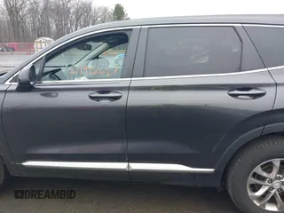 2020 Hyundai Santa Fe SE with VIN 5NMS2CAD8LH258275, listed as a IAAI auction lot 41912687 with 80,467 mi miles and . Bid and sale history available at DreamBid. Image 15.