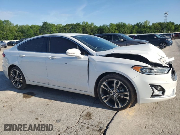 2020 Ford Fusion Titanium with VIN 3FA6P0D98LR176335, listed as a Copart auction lot 55323275 with 76,572 mi miles and Salvage title. Bid and sale history available at DreamBid. Image 4.