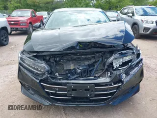 2021 Honda Accord Touring z VIN 1HGCV2F91MA022042, wystawiony jako IAAI lot #42301183 z przebiegiem 67 397 mil mil oraz . Historia ofert i sprzedaży dostępna na DreamBid. Obrazek 12.