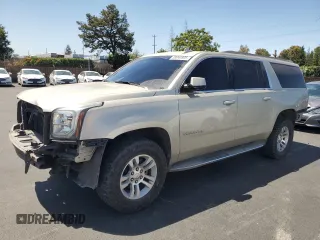 2015 GMC Yukon XL SLT z VIN 1GKS1HKC3FR654303, wystawiony jako Copart lot #59044805 z przebiegiem 73 436 mil mil oraz Szkoda całkowita • Salvage title. Historia ofert i sprzedaży dostępna na DreamBid. Obrazek 1.