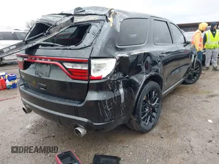 2015 Dodge Durango R/T with VIN 1C4SDHCT4FC169494, listed as a IAAI auction lot 41190653 with 177,887 mi miles and . Bid and sale history available at DreamBid. Image 4.