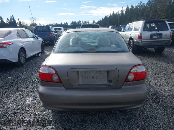 2001 Kia Sephia z VIN KNAFB121815046919, wystawiony jako IAAI lot #41398257 z przebiegiem 191 818 mil mil oraz . Historia ofert i sprzedaży dostępna na DreamBid. Obrazek 17.