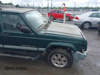 2000 Jeep Cherokee with VIN 1J4FT48S4YL240347, listed as a IAAI auction lot 42361311 with Not provided miles and . Bid and sale history available at DreamBid. Image 11.