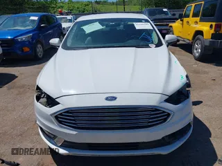 2017 Ford Fusion SE z VIN 3FA6P0H90HR246900, wystawiony jako IAAI lot #42169109 z przebiegiem 178 878 mil mil oraz . Historia ofert i sprzedaży dostępna na DreamBid. Obrazek 13.