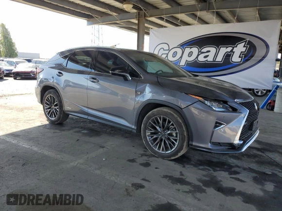 2017 Lexus RX 450h with VIN 2T2BGMCA5HC020127, listed as a Copart auction lot 53354345 with 121,451 mi miles and Salvage title. Bid and sale history available at DreamBid. Image 4.