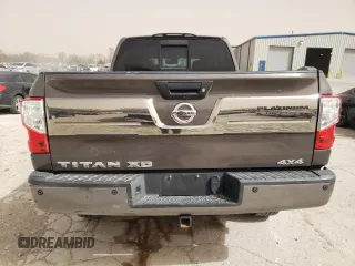 2016 Nissan Titan Pro-4X z VIN 1N6BA1F4XGN502773, wystawiony jako Copart lot #49285535 z przebiegiem 129 390 mil mil oraz Czysty tytuł • Clean title. Historia ofert i sprzedaży dostępna na DreamBid. Obrazek 6.