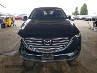 2018 Mazda CX-9 Sport with VIN JM3TCABY2J0220049, listed as a Copart auction lot 60175175 with 56,140 mi miles and Salvage title. Bid and sale history available at DreamBid. Image 5.