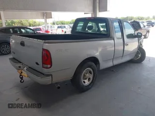 2003 Ford F-150 XL with VIN 1FTRX17213NB36760, listed as a IAAI auction lot 42170424 with 130,768 mi miles and . Bid and sale history available at DreamBid. Image 4.