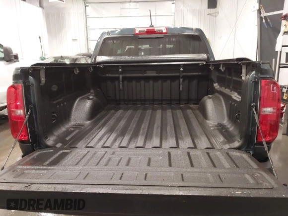 2020 Chevrolet Colorado 4WD Z71 with VIN 1GCGTDEN1L1163546, listed as a IAAI auction lot 41706719 with 64,662 mi miles and . Bid and sale history available at DreamBid. Image 17.