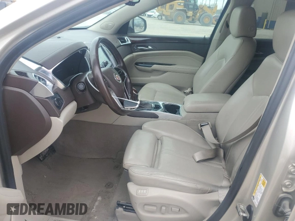2015 Cadillac SRX Luxury Collection z VIN 3GYFNEE33FS606531, wystawiony jako Copart lot #53088485 z przebiegiem 115 140 mil mil oraz Szkody całkowita. Historia ofert i sprzedaży dostępna na DreamBid. Obrazek 7.