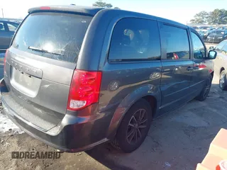 2016 Dodge Grand Caravan SE with VIN 2C4RDGBG1GR357895, listed as a IAAI auction lot 41389733 with 131,175 mi miles and . Bid and sale history available at DreamBid. Image 4.