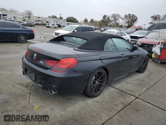 2014 BMW M6 z VIN WBSLZ9C50EDZ78599, wystawiony jako Copart lot #84724974 z przebiegiem 115 051 mil mil oraz Czysty tytuł • Clean title. Historia ofert i sprzedaży dostępna na DreamBid. Obrazek 3.