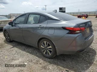 2021 Nissan Versa SV with VIN 3N1CN8EV3ML880947, listed as a Copart auction lot 60303965 with 98,646 mi miles and Salvage title. Bid and sale history available at DreamBid. Image 2.