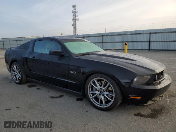 2012 Ford Mustang GT Premium with VIN 1ZVBP8CF6C5271586, listed as a Copart auction lot 83878894 with 101,016 mi miles and Salvage Title. Bid and sale history available at DreamBid. Image 4.