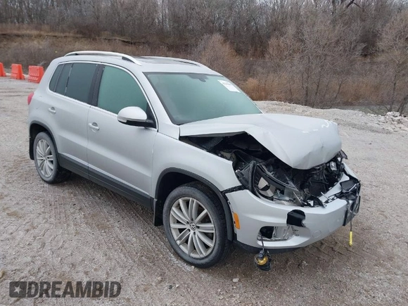 2016 Volkswagen Tiguan SEL z VIN WVGBV7AX3GW594729, wystawiony jako IAAI lot #41233805 z przebiegiem 92 997 mil mil oraz . Historia ofert i sprzedaży dostępna na DreamBid. Obrazek 1.