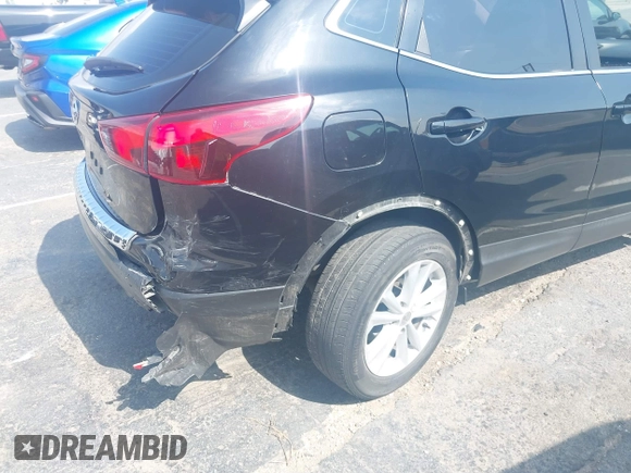 2017 Nissan Rogue SV with VIN JN1BJ1CP6HW021810, listed as a IAAI auction lot 42174714 with 91,180 mi miles and . Bid and sale history available at DreamBid. Image 6.