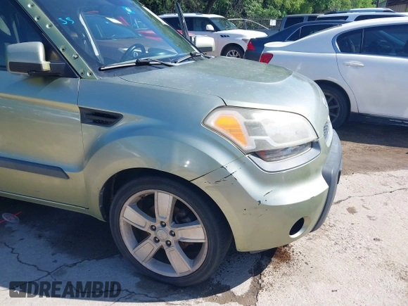 2010 Kia Soul + with VIN KNDJT2A20A7102463, listed as a IAAI auction lot 42093896 with 178,736 mi miles. Bid and sale history available at carsss.com. Image 6.