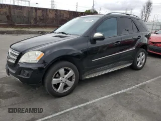 2009 Mercedes-Benz M 3.5L with VIN 4JGBB56E89A524440, listed as a Copart auction lot 43082805 with 185,084 mi miles and Salvage Title. Bid and sale history available at carsss.com. Image 1.