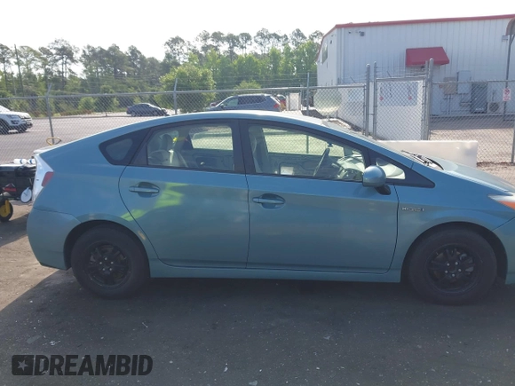 2014 Toyota Prius Four with VIN JTDKN3DUXE1852835, listed as a IAAI auction lot 42234128 with 189,512 mi miles and . Bid and sale history available at DreamBid. Image 13.