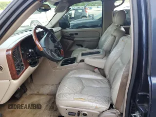 2004 GMC Yukon SLT z VIN 1GKEC13ZX4R203707, wystawiony jako Copart lot #56866075 z przebiegiem Nie podano mil oraz Szkoda całkowita • Salvage title. Historia ofert i sprzedaży dostępna na DreamBid. Obrazek 7.