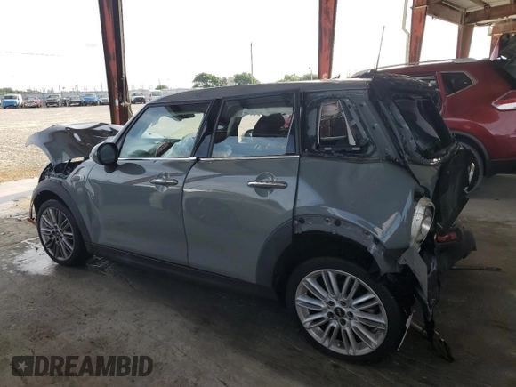 2018 MINI Hardtop 4 Door Cooper with VIN WMWXU1C55J2F79623, listed as a Copart auction lot 60515015 with Not provided miles and Salvage title. Bid and sale history available at DreamBid. Image 2.