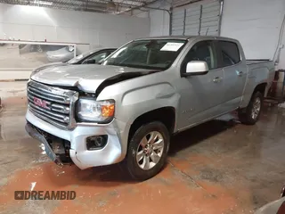 2015 GMC Canyon 2WD SLE with VIN 1GTG5BE36F1237805, listed as a IAAI auction lot 41399321 with 155,288 mi miles. Bid and sale history available at carsss.com. Image 2.