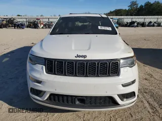 2018 Jeep Grand Cherokee High Altitude with VIN 1C4RJECG1JC125602, listed as a Copart auction lot 88702275 with 59,701 mi miles and Salvage title. Bid and sale history available at DreamBid. Image 5.